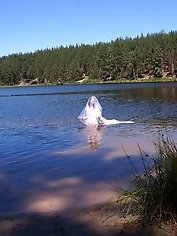 An older woman with perfect breast shape.