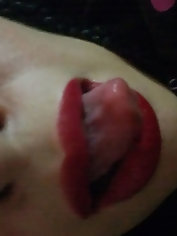 A mature woman performs oral sex and holds semen in her mouth