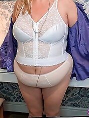 Erotic mamas are taking off their dress for a photoshoot